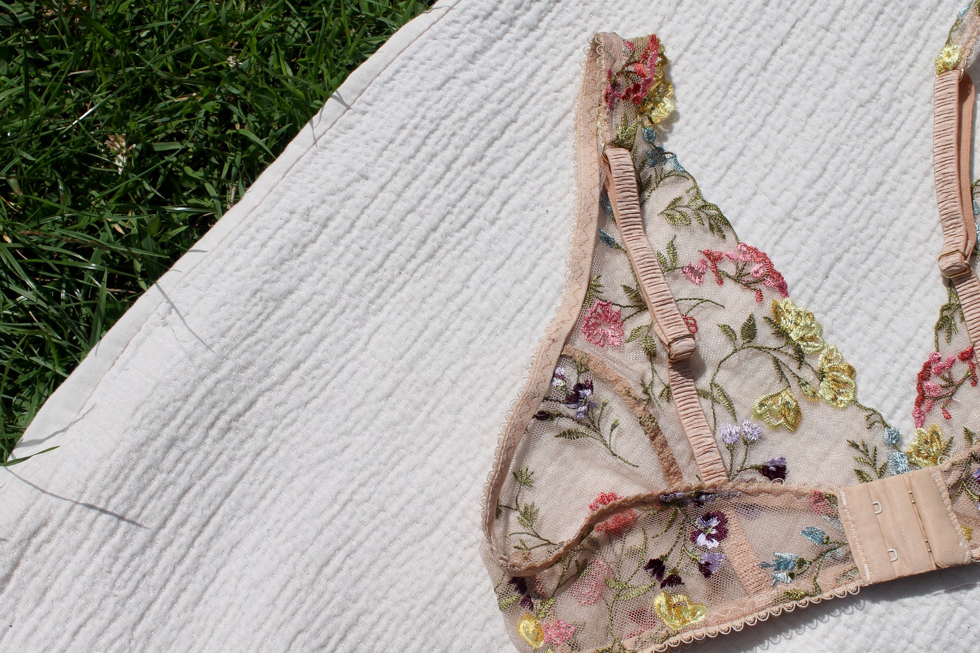 Back view close up of embroidered floral lace bralette