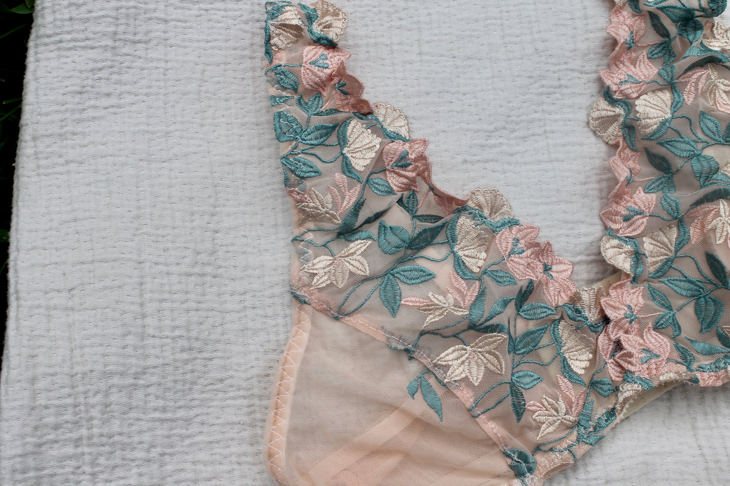 Blush lace bralette with embroidered flowers